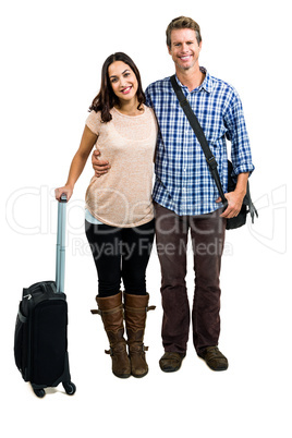 Portrait of Cheerful couple with luggage