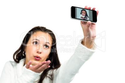 Beautiful woman taking selfie
