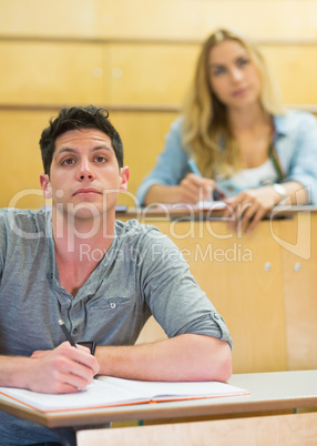 Thoughtful male student during class