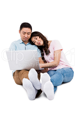 Couple working on laptop