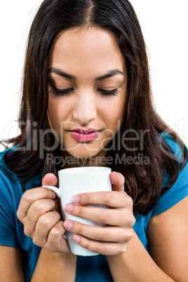 Beautiful woman holding coffee cup