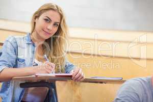 Smiling female student during class