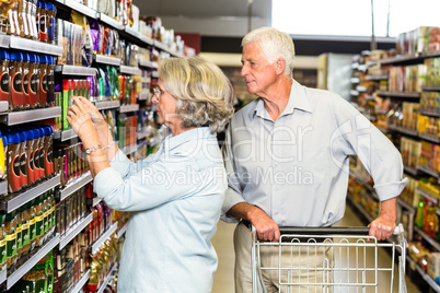 Senior couple choosing food