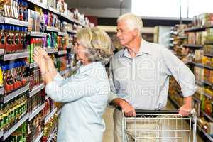 Senior couple choosing food