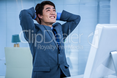 Relaxed businessman look up