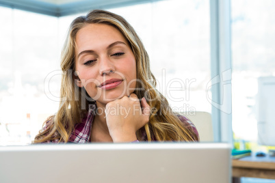 Young girl uses his computer