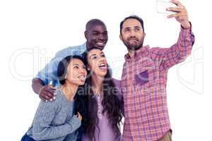 Multi-ethnic friends making face while taking selfie
