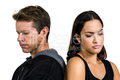 Upset couple against white background