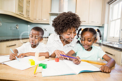 Mother checking children homework