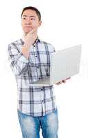 Thoughtful man holding laptop