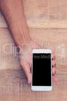 Man holding on phone with black screen