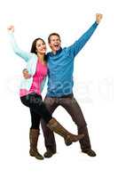 Happy successful couple with hands raised