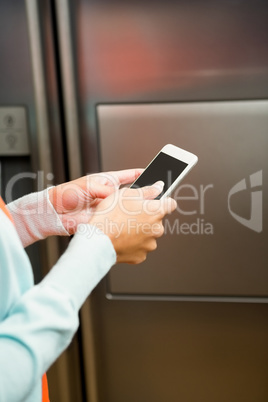 Close up of woman using smartphone