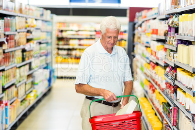 Senior man buying food