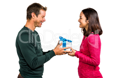 Girlfriend taking gift from boyfriend