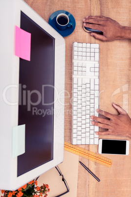 High angle view of businessman working on computer
