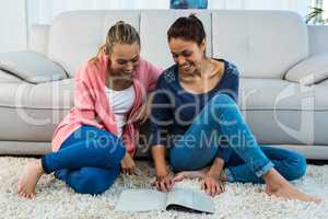 Friends reading on the carpet