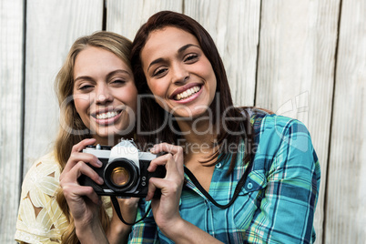 Two smiling female friends