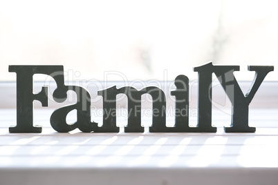 Beautiful background with the words Family, mother's day or father's day. The idea for postcards