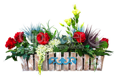 Beautiful colorful flowers in wooden box isolated on white background, bouquet for March 8, birthday or St. Valentine's day