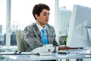 Businessman working on his computer