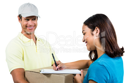 Cheerful delivery man with customer