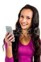 Attractive woman holding smartphone and looking at the camera