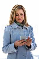 woman looking at her phone