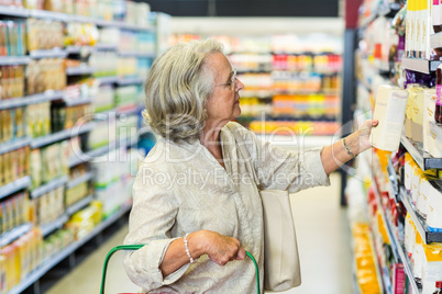 Senior woman buying food