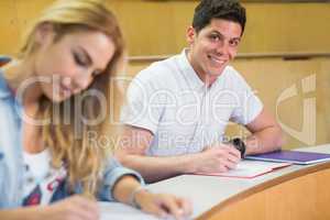 Male students smiling at camera