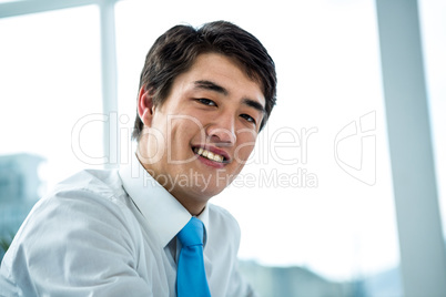Happy smiling asian businessman