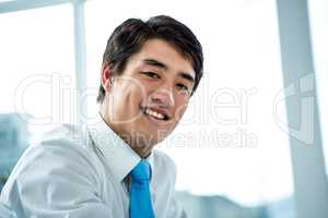 Happy smiling asian businessman