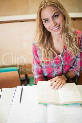 Smiling female student during class