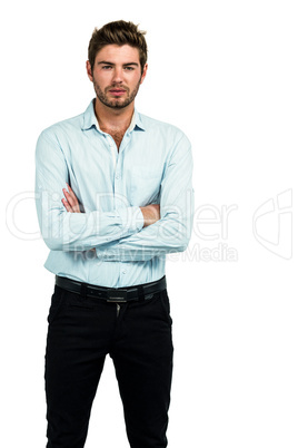 Standing man with arms crossed posing for the camera