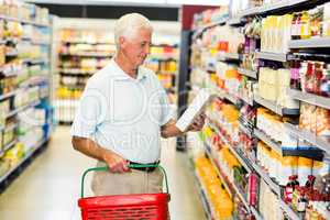 Senior man buying food