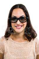 Portrait of happy young woman wearing sunglasses