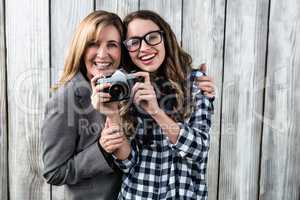 Mother and daughter taking a picture