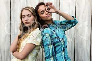 Two friends making posing and making gesture