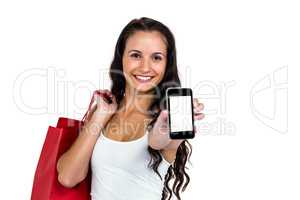 Smiling woman showing smartphone