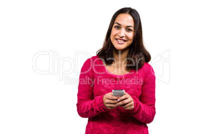 Portrait of smiling woman using mobile phone