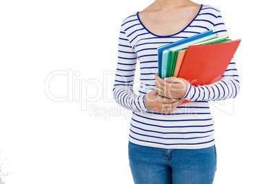 Mid section of woman holding files