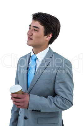 Asian businessman drinking coffee