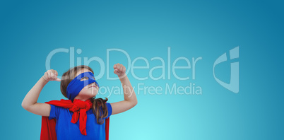 Composite image of masked girl pretending to be superhero