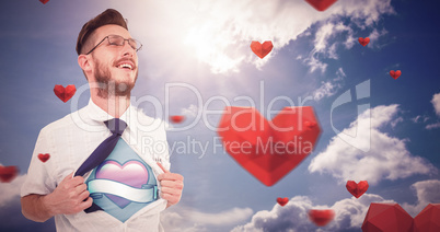 Composite image of geeky hipster opening shirt superhero style