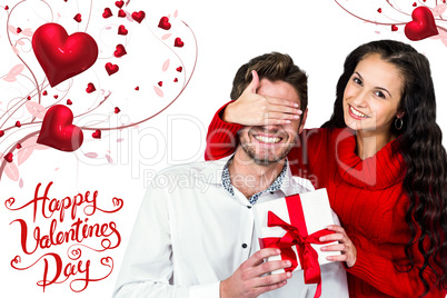 Composite image of young woman covering eyes of partner holding