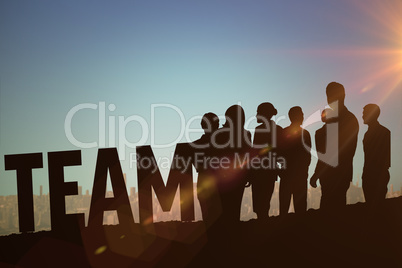 Composite image of silhouetters celebrating