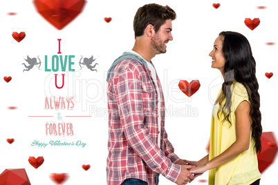 Composite image of smiling couple holding hands and looking at e