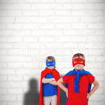 Composite image of masked kids pretending to be superheroes