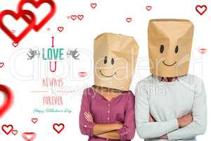 Composite image of couple covering their faces with paper bag wi