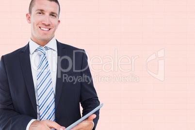 Composite image of businessman using tablet pc